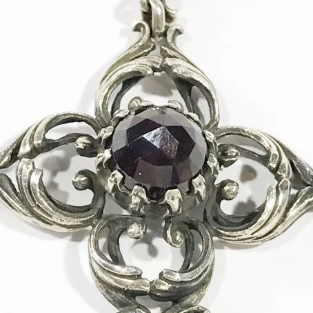 antique Austrian cross in silver and garnet details