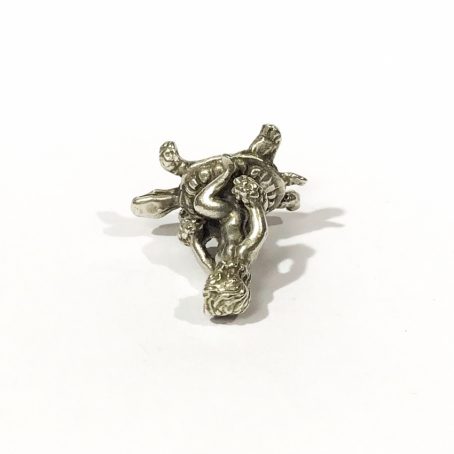 collector’s silver miniature putto on turtle