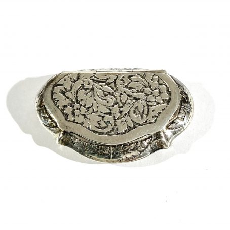 small pill holder with floral decorations