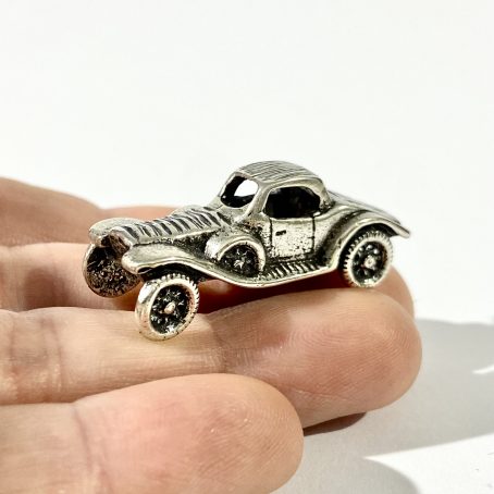 miniature retro car in silver